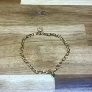 Gemini horoscope charms on gold chain bracelet